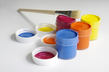 gouache of paint and brush on white background