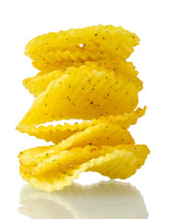 Delicious potato chips isolated on white