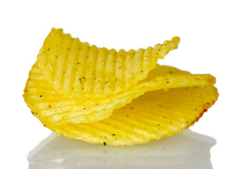 Delicious potato chips isolated on white