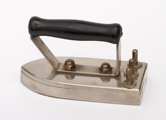 old electric chromium plated travel iron on white