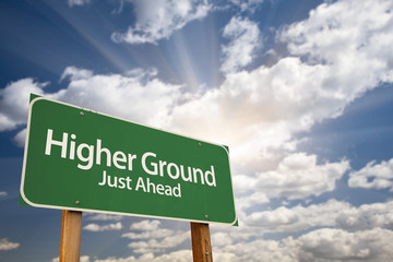 Higher Ground Green Road Sign