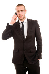 young business man talking on mobil phone, isolated on white