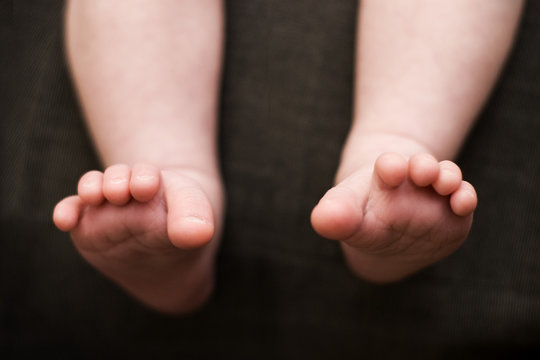 Infant Feet with Toes Curled