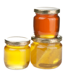 honey in jars isolated