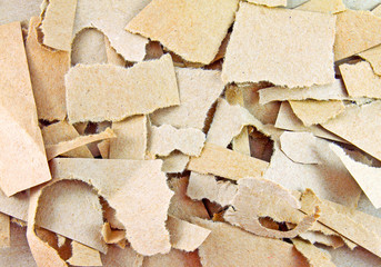 Close up of torn pieces of brown paper