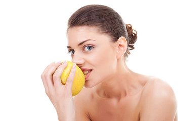 Obraz na płótnie Canvas cheerful young lady eating an apple