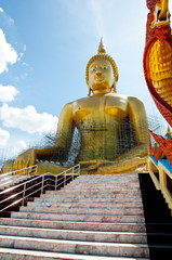 The golden statue of Lord Buddha head