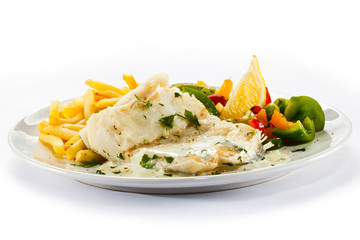 Fish dish - fish fillet, French fries and vegetables