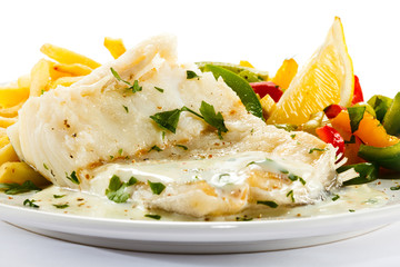 Fish dish - fish fillet, French fries and vegetables