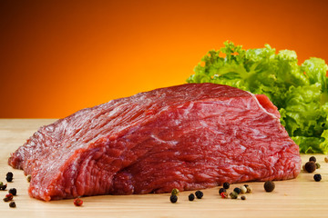 Raw beef on cutting board