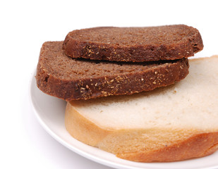 Fototapeta na wymiar White and rye bread.