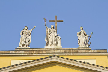 Fototapeta na wymiar Figures of Faith, Hope and Love. Cathedral in Eger