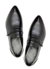 Pair of black male shoes over white, view from above