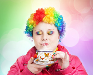 Rainbow Clown with cup of tea