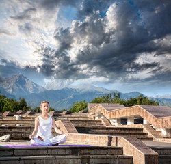 Urban Yoga meditation at mountains