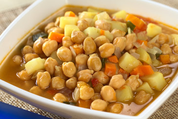 Chickpea soup with carrots, potatoes, onions, leek