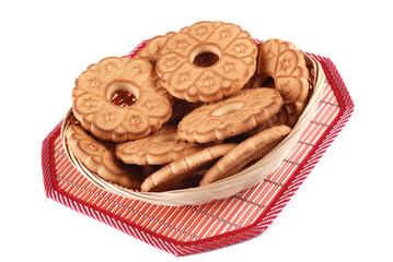 Basket with cookies on a napkin
