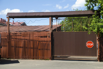 Gate with an inscription "stop"