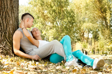 couple relaxing in park