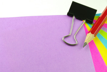 colour note paper pencil and clip