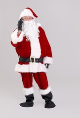 Santa talking on mobile phone