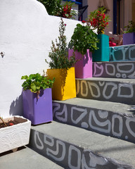 traditional Greek house entrance and flowerpots