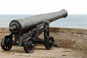 Fototapeta na wymiar Old Canon on Battlements