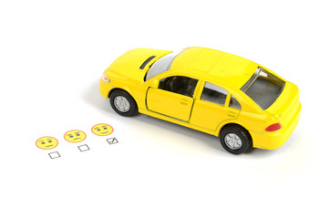 Toy car and emoticon