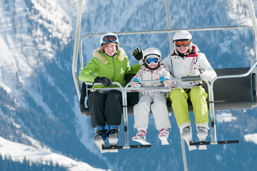 Ski lift - family  on ski vacation