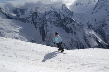 Snowboarder on ski slope