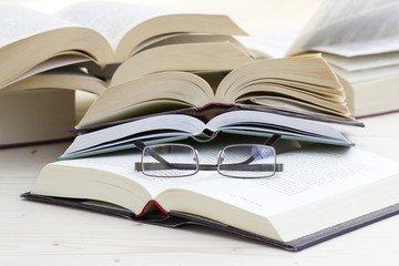 opened books and glasses