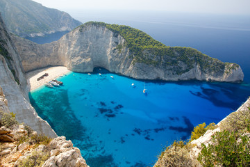 Top view of Navagio beach in Greece with cruisers