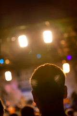 Man head silhouette with concert lights