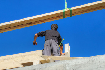 Fototapeta premium construction de maison - charpentier