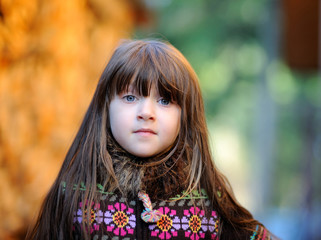 Portrait of adorable little girl with loose hair