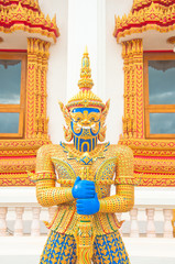 Fototapeta premium blue face giant statue guard with weapon