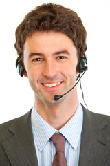 Portrait of smiling businessman with headset