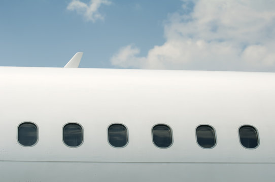 Fototapeta Windows of an airplane outside