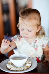 Girl eating breakfast