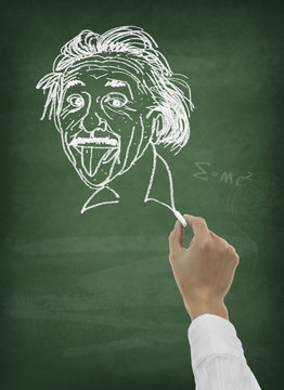 Hand drawing scientist portrait on greenboard