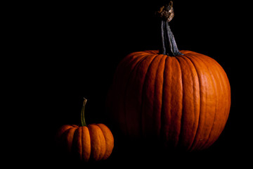 Ripe pumpkin fruits isolated on balck