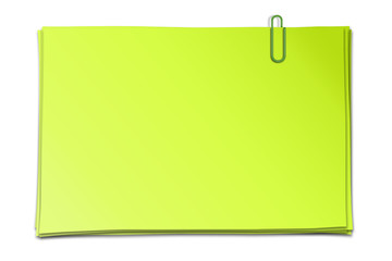 Stapel mit grünen Zetteln