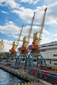 Three old port cranes