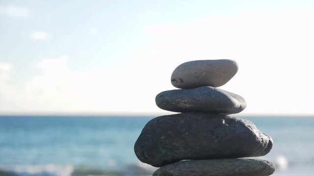 Beach - Stones Stacked with Ocean in Background