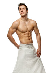 Muscle sexy naked young man wrapping in sheet
