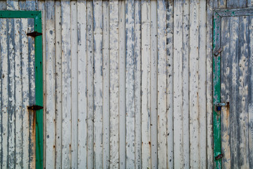 Closeup of an old white fishing shed