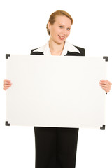 Woman holding a white board.