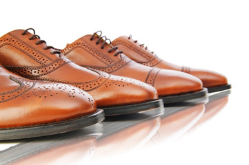 Fashion concept with male shoes on white