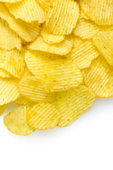 Delicious potato chips isolated on white