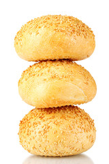 delicious buns with sesame seeds isolated on white